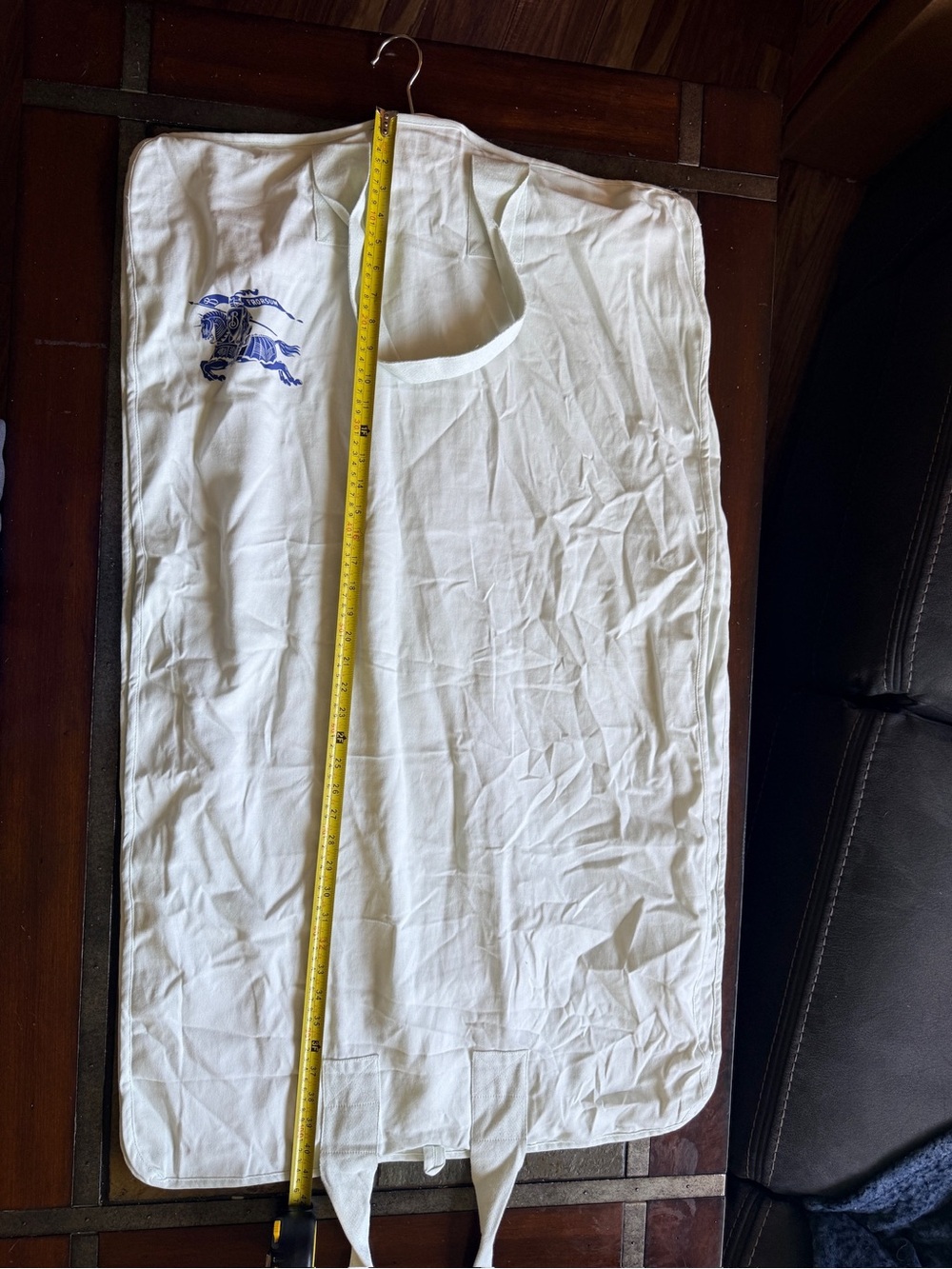 Burberry garment bag and the hanger designer clothes luxury travel resort vacay